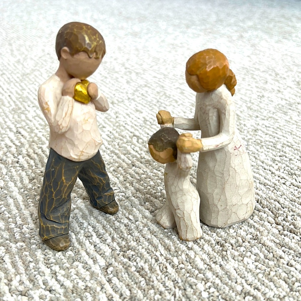 Two willow tree figurines